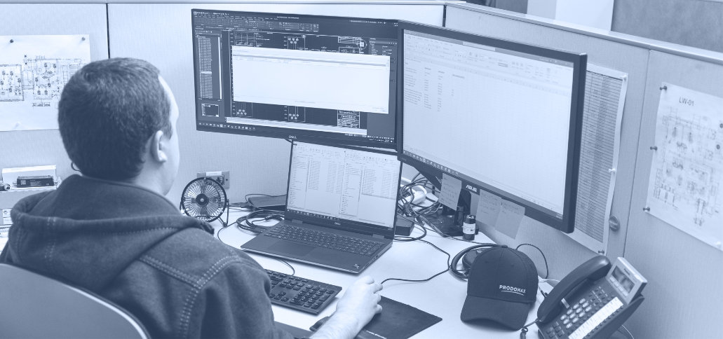 Worker reviewing data on a computer screen